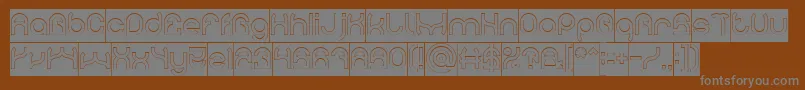 Шрифт PLASTIC Hollow Inverse – серые шрифты на коричневом фоне