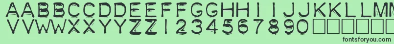 Plastique Font – Black Fonts on Green Background