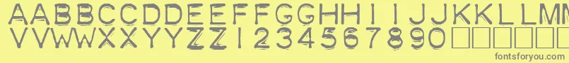 Plastique Font – Gray Fonts on Yellow Background