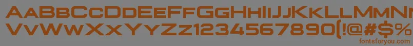フォントPlateia Bold – 茶色の文字が灰色の背景にあります。