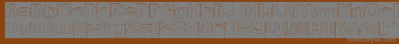 Play The Game Hollow Inverse-Schriftart – Graue Schriften auf braunem Hintergrund
