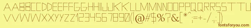 フォントHolitterPhosphore – 茶色の文字が黄色の背景にあります。