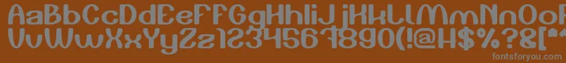 フォントPlay The Game – 茶色の背景に灰色の文字