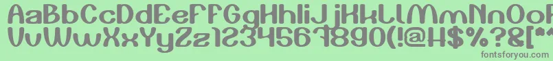 フォントPlay The Game – 緑の背景に灰色の文字