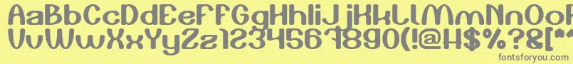 フォントPlay The Game – 黄色の背景に灰色の文字