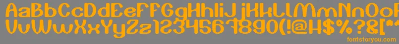 フォントPlay The Game – オレンジの文字は灰色の背景にあります。