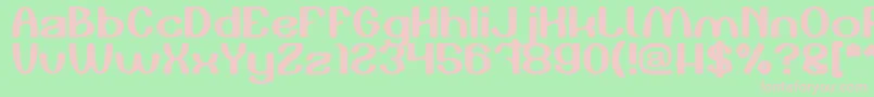 Play The Game-fontti – vaaleanpunaiset fontit vihreällä taustalla
