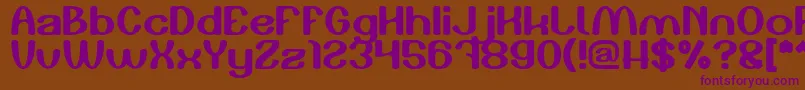 Play The Game-fontti – violetit fontit ruskealla taustalla