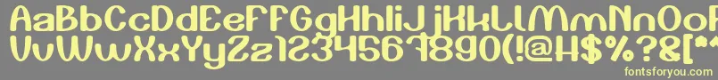 Play The Game-Schriftart – Gelbe Schriften auf grauem Hintergrund