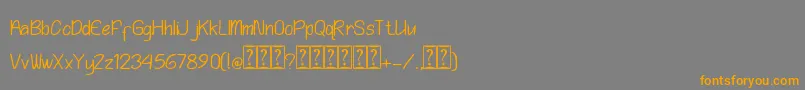 フォントPlaying Bumb – オレンジの文字は灰色の背景にあります。