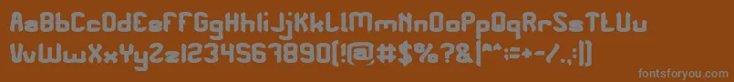 Fonte PLEASE FORGIVE ME Bold – fontes cinzas em um fundo marrom