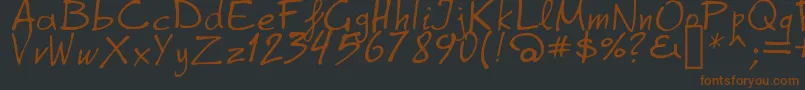 GrapheAlpha Font – Brown Fonts on Black Background