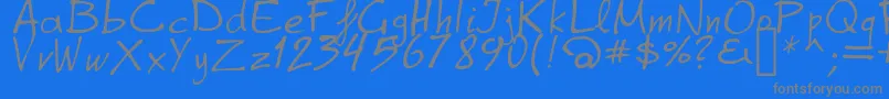 GrapheAlpha-Schriftart – Graue Schriften auf blauem Hintergrund