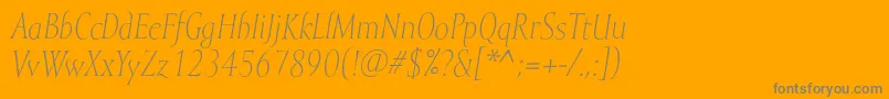 MramorlightItalic-Schriftart – Graue Schriften auf orangefarbenem Hintergrund