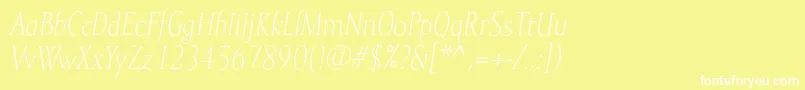 MramorlightItalic-fontti – valkoiset fontit keltaisella taustalla