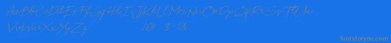 フォントPoems  Pens Bold Italic – 青い背景に灰色の文字