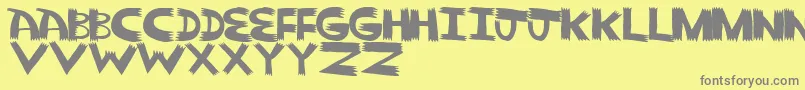 Pointy Solid Font – Gray Fonts on Yellow Background