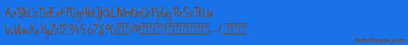 Pollaroid Font – Brown Fonts on Blue Background