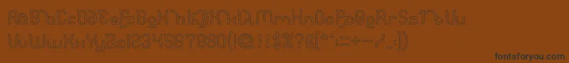 Polysoup Hollow-Schriftart – Schwarze Schriften auf braunem Hintergrund