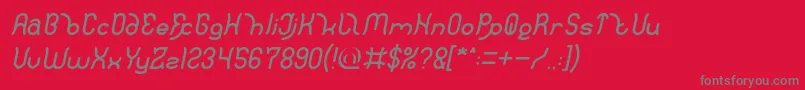 Fonte Polysoup Italic – fontes cinzas em um fundo vermelho