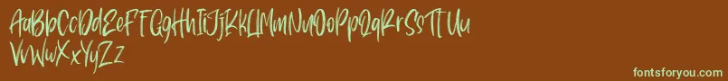 Pondspell Font – Green Fonts on Brown Background