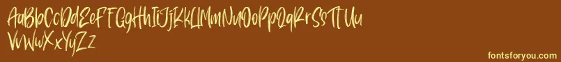 Pondspell Font – Yellow Fonts on Brown Background