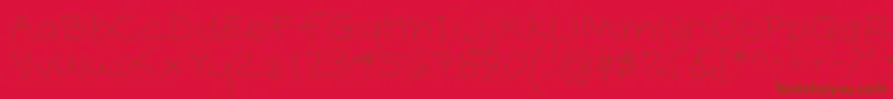Popcorn Mountain  Standard Thin-Schriftart – Braune Schriften auf rotem Hintergrund