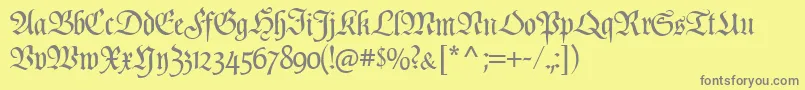 Poppl  Fraktur CAT-fontti – harmaat kirjasimet keltaisella taustalla