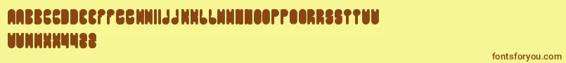Fonte PORTABLE – fontes marrons em um fundo amarelo