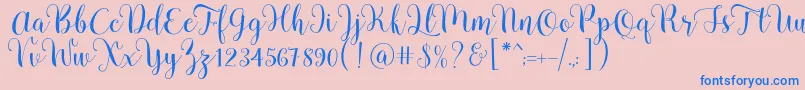 Pradyse Script Free Demo-Schriftart – Blaue Schriften auf rosa Hintergrund