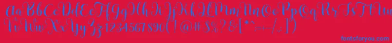 Pradyse Script Free Demo Font – Blue Fonts on Red Background