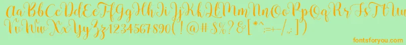 Pradyse Script Free Demo Font – Orange Fonts on Green Background