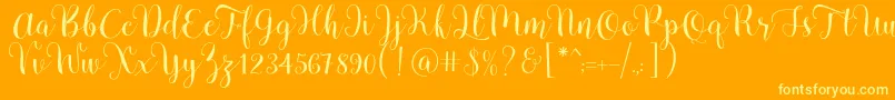 Шрифт Pradyse Script Free Demo – жёлтые шрифты на оранжевом фоне