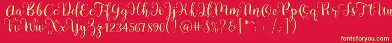 Шрифт Pradyse Script Free Demo – жёлтые шрифты на красном фоне