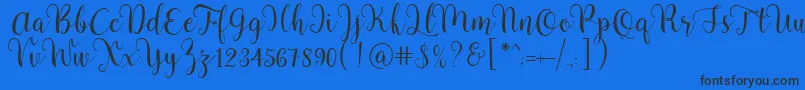 Fonte Pradyse Script Free Demo – fontes pretas em um fundo azul