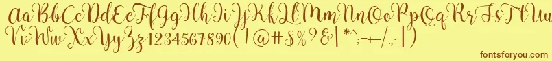 Pradyse Script Free Demo Font – Brown Fonts on Yellow Background