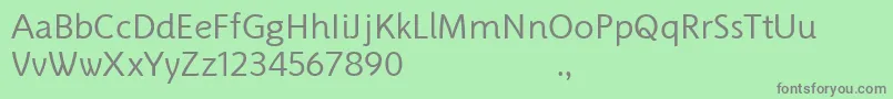 PragneaDemo Regular-fontti – harmaat kirjasimet vihreällä taustalla