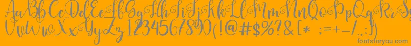 Pretty Queen-Schriftart – Graue Schriften auf orangefarbenem Hintergrund