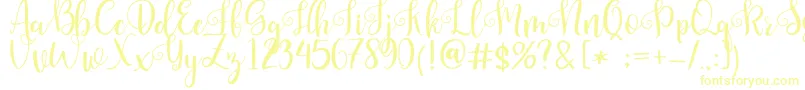フォントPretty Queen – 白い背景に黄色の文字