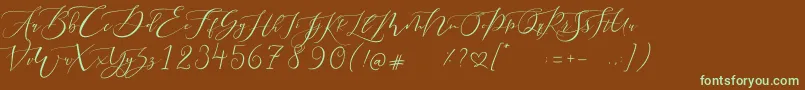フォントPretty Women script – 緑色の文字が茶色の背景にあります。