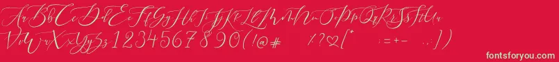 フォントPretty Women script – 赤い背景に緑の文字