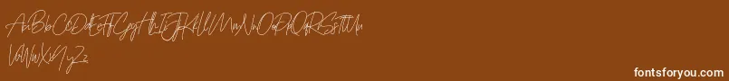 Prettygirlfree Font – White Fonts on Brown Background