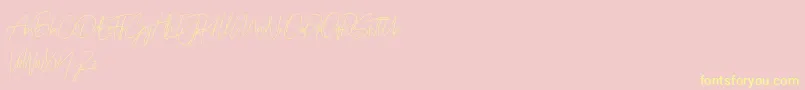 Prettygirlfree Font – Yellow Fonts on Pink Background