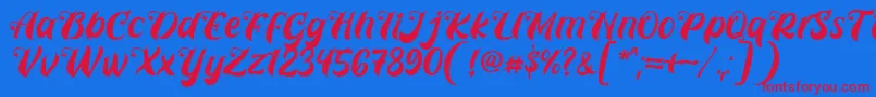 Czcionka Prettyla Font By 7NTypes D – czerwone czcionki na niebieskim tle