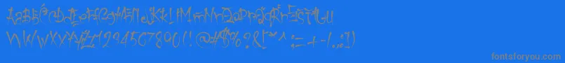 フォントKeetanoGaijin – 青い背景に灰色の文字