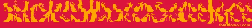 フォントWcFetishBta – 赤い背景にオレンジの文字