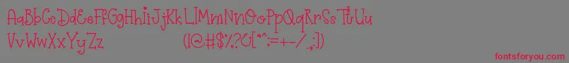 フォントPrimrose – 赤い文字の灰色の背景