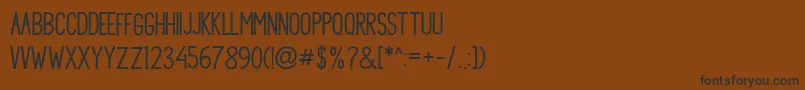 Princella Sans-Schriftart – Schwarze Schriften auf braunem Hintergrund