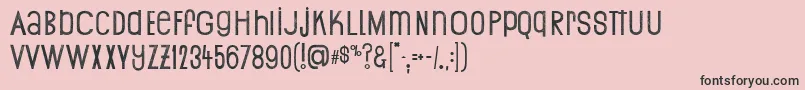 Print Ogresse Font – Black Fonts on Pink Background