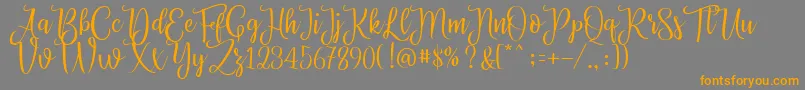 Priscilla Script Font – Orange Fonts on Gray Background